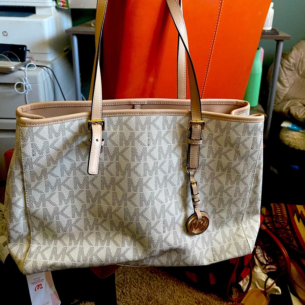 Michael Kors handbag and matching wallet.